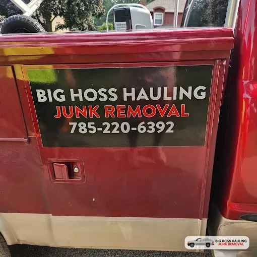 Big Hoss Hauling Junk Removal sign on the truck door