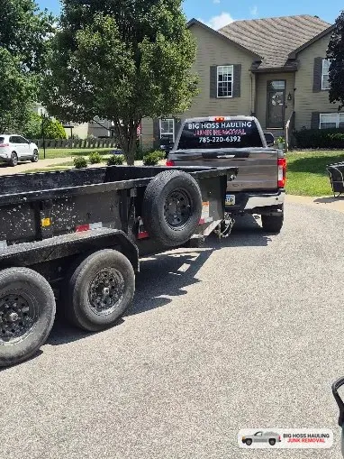 Truck and trailer backed into a driveway